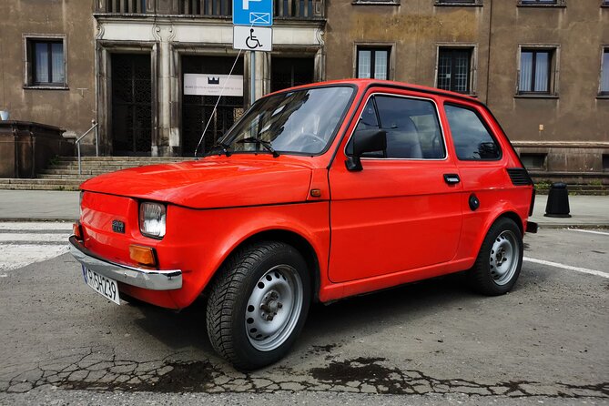 1.5h Crazy Guides' Communism Tour of Nowa Huta in Classic Car - Stop 2: Lenin Steelworks gate and administrative buildings