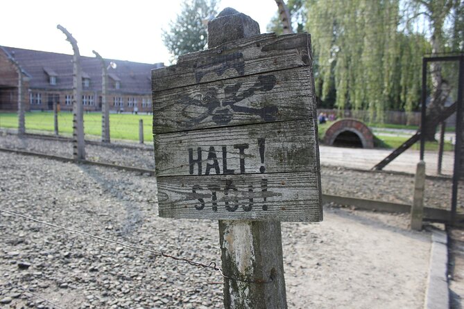 Auschwitz and Birkenau Memorial and Museum Guided Tour from Krakow - Getting to Auschwitz from Krakow, pickup timing, and the real day length