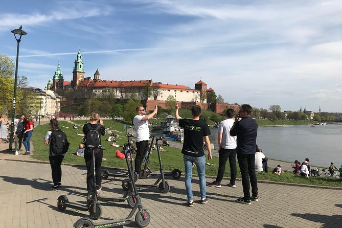Electric Scooter Tours Kraków - The Wawel Dragon moment: fun legend in the middle of serious stops