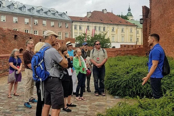 Explore the Stunning Warsaw Old Town, Royal Way & Hidden Gems - Entering Warsaw’s Old Town at Castle Square