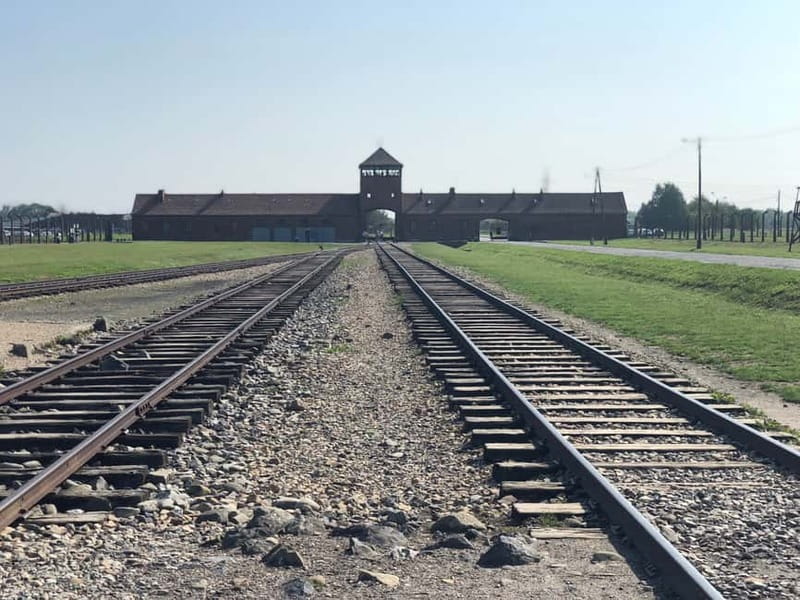From Krakow: Auschwitz-Birkenau Guided Tour & Pickup - Pickup logistics in Krakow and the coach ride to the memorial