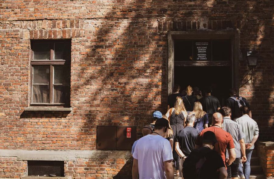 From Krakow: Auschwitz-Birkenau Live Guided Tour & Pickup - Auschwitz I, the gate, and why the first part needs structure