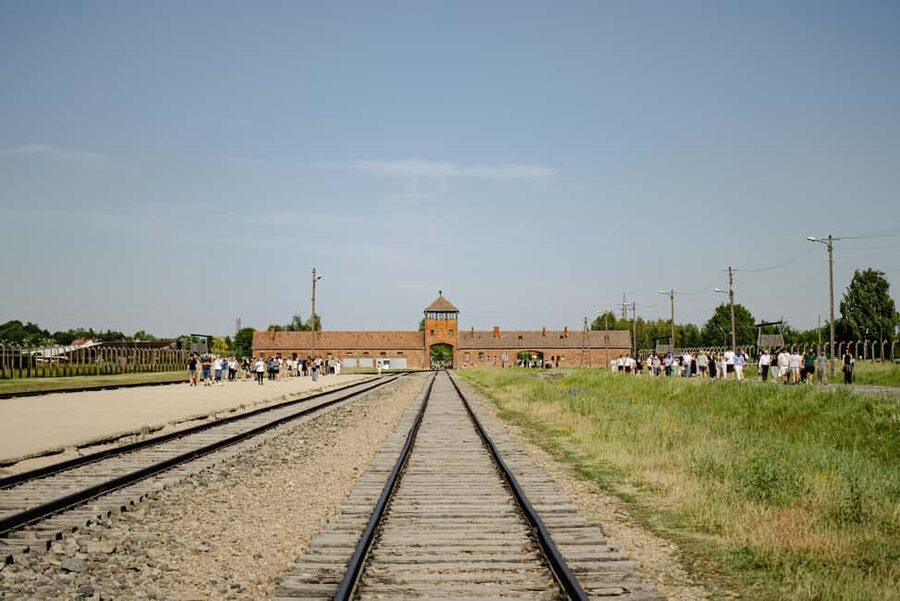 From Krakow: Auschwitz-Birkenau Live Guided Tour & Pickup - Auschwitz II-Birkenau: the largest section and the story in space