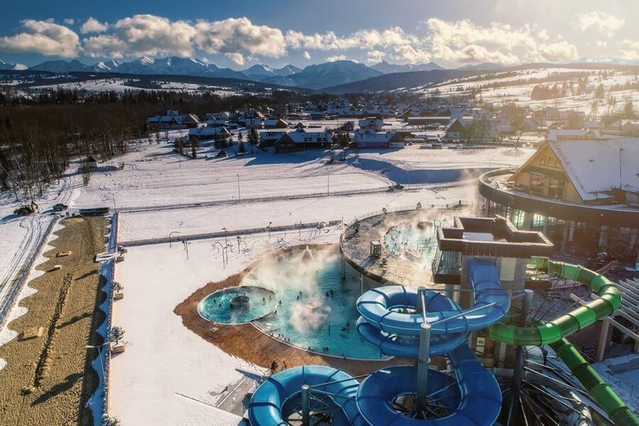 From Krakow: Snowmobile adventure and Thermal Baths tour - Chochołów UNESCO village stop: quick culture before the adrenaline