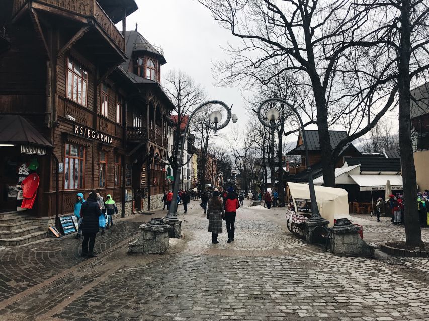 From Krakow: Zakopane & Hot Springs Day Tour - Zakopane town center and Krupówki Street: shopping time with a loud pulse