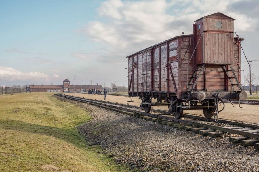 From Warsaw: Guided Tour to Auschwitz-Birkenau and Krakow - Auschwitz I guided visit, where the place explains the system