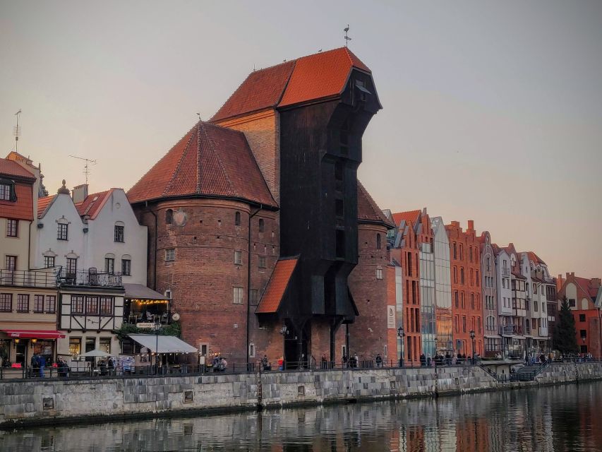 Gdańsk City Sights & History Guided Walking Tour in English - Harbor engineering at the Zuraw crane, a symbol you can spot from far away
