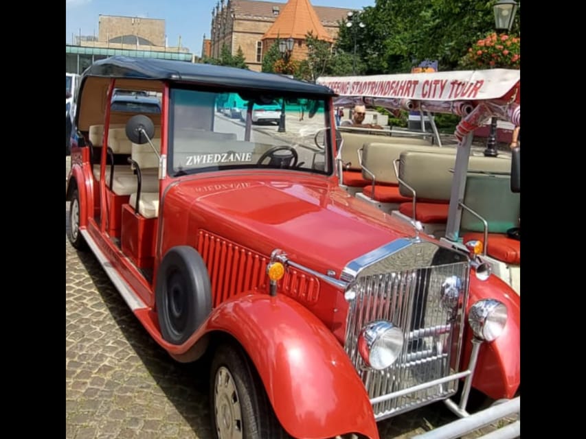 Gdańsk: City Tour by Electric Golf Cart - Highland Gate, Prison Tower, and Torture Chamber, Where Defenses Become Stories