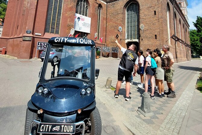 GDANSK City Tour by Golf Cart Live Guide & City Sightseeing 90min - Churches and chapels that separate style from storytelling