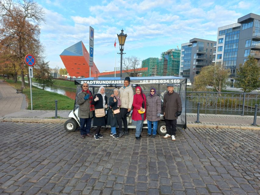 Gdansk: City Tour Live Guided by Golf Cart/Buggy Sightseeing - Golden Gate: a quick look at power at the city edge