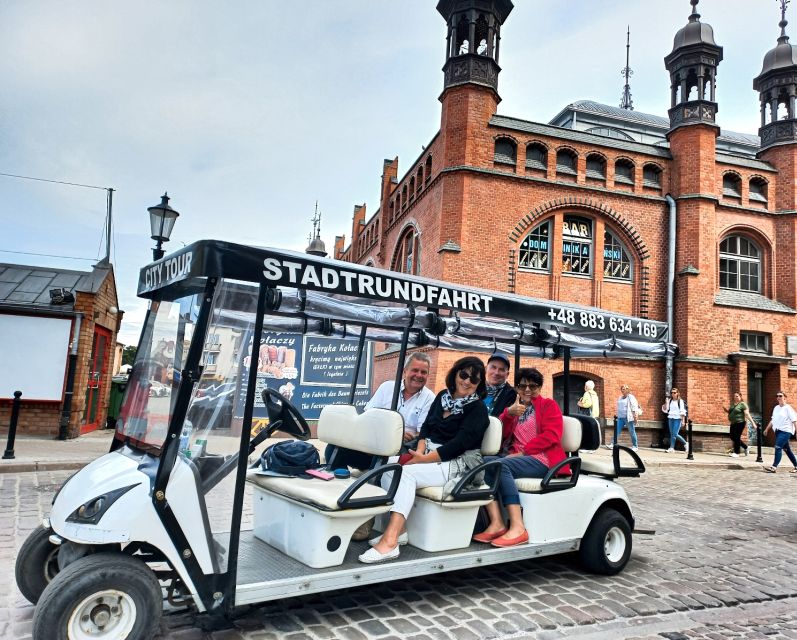 Gdansk: City Tour Live Guided by Golf Cart/Buggy Sightseeing - Gdansk Shipyard: where industry and city identity overlap