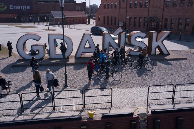 Gdansk Highlights Bicycle Tour - Neptune’s Fountain and Golden Gate: start with the symbols