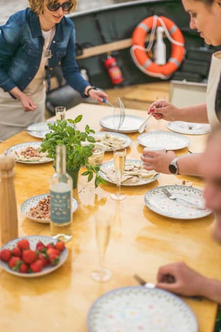 Gdańsk: Motława River Cruise with Pierogi Tasting - Weather Reality: Open Deck, Blankets, and Umbrellas