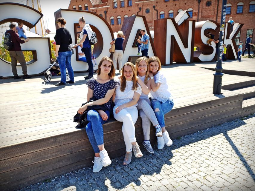 Gdansk Old Town Half-Day Private Walking Tour - Town Hall area, Neptun Fountain photos, and Arthur’s Court merchant life