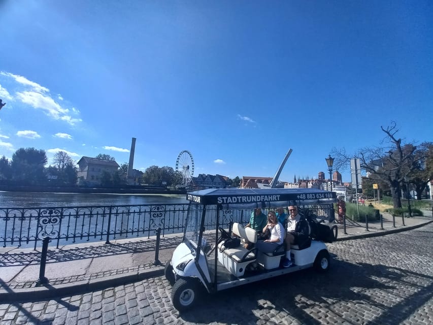 Gdansk: Private Top City Tour by Electric Cart & Live Guided - Old Town icons: Neptune’s Fountain, Artus Court, and Long Market