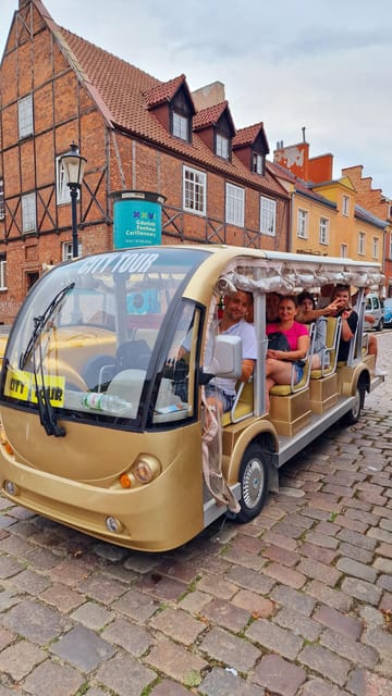 Gdansk: Shared or Private City Tour Sightseeing by Golf Cart - Riding the Old Town in a heated electric cart