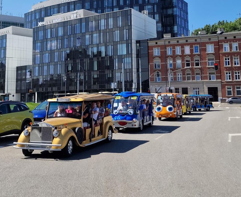 Gdansk: Shared or Private City Tour Sightseeing by Golf Cart - Medieval gates and tough history: Golden Gate, Brama Wyżynna, and Katownia