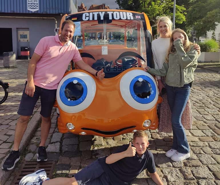 Gdansk: Shared/Private Golf Cart City Tour with Local Guide - Market Hall, the Crane, and port views that explain the city’s power