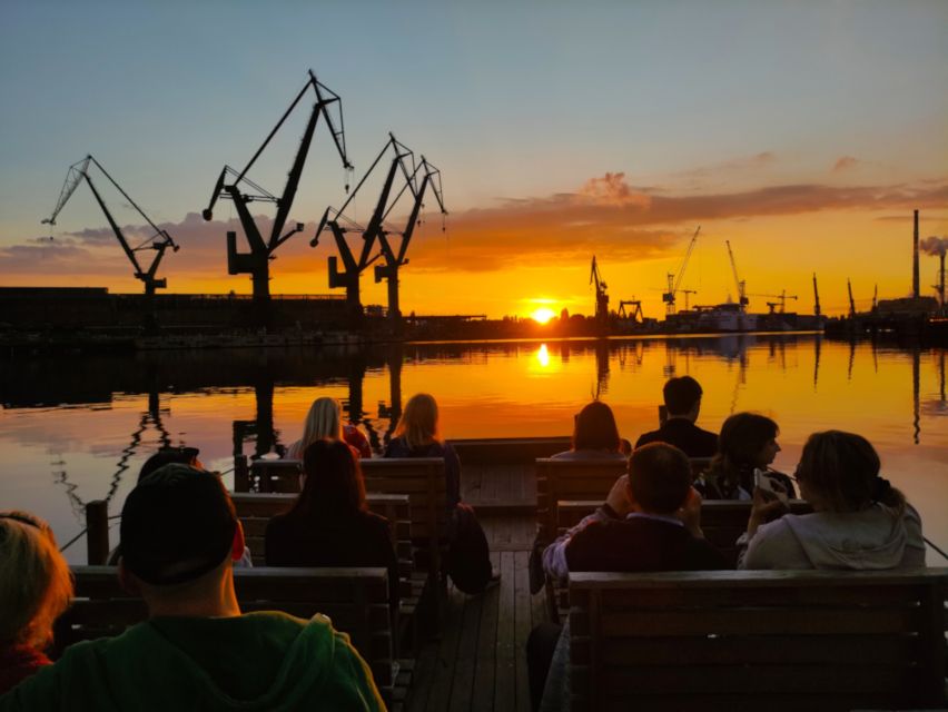 Gdańsk: Sunset Cruise on a Historic Polish Boat - Sunset at the shipyard cranes: where the photos actually come from