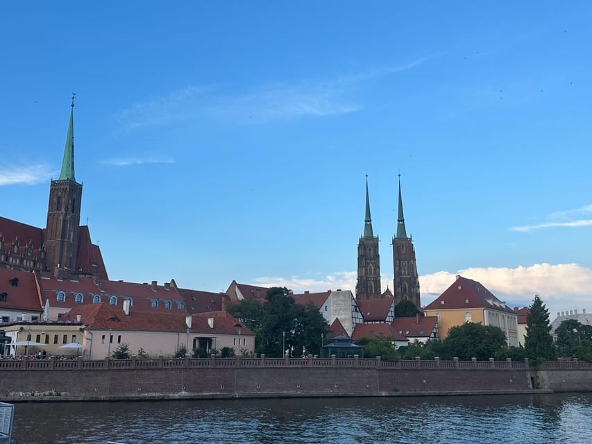 Group city tour (walking tour) through Wroclaw in German - Market Square and Wrocław Town Hall, where the city’s civic power shows