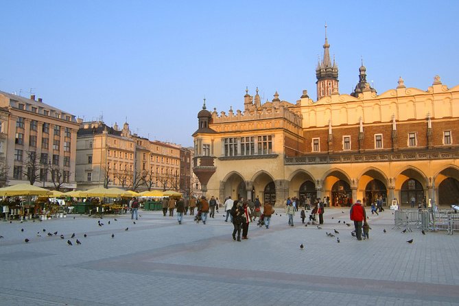 In 10 days around Poland - by train, with hotels and local tours - Day 6 Poznan guided cathedral and town hall mix