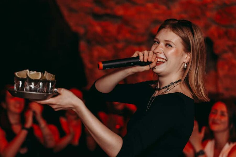Krakow: 6 pm Tipsy Bar Tour With Karaoke+Twist (Thu-Fri-Sat) - Stops 2 and 3: drinking games, challenges, and bar-hopping momentum