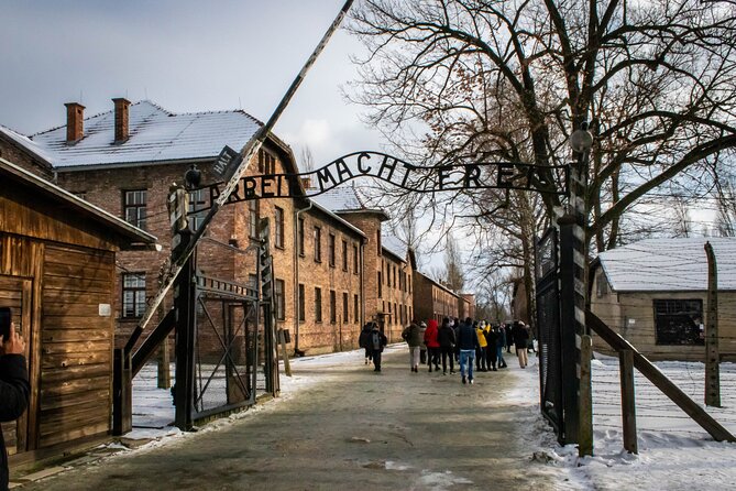 Krakow: Auschwitz-Birkenau Guided Tour with Ticket and Transfer - Getting to Auschwitz: Transfers, Start-Time Changes, and What to Pack