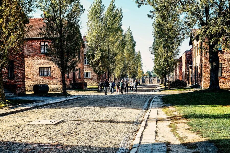 Krakow: Auschwitz-Birkenau Live Guided Tour & Hotel Pickup - Auschwitz I: the main camp, Block 11, and why the route starts here
