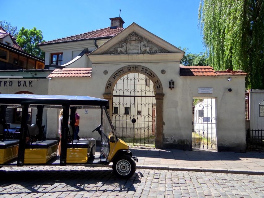 Krakow: City Tour by Electric Golf Cart - Podgórze and the ghetto sites: Ghetto Heroes Square, Eagle Pharmacy, and wall remains