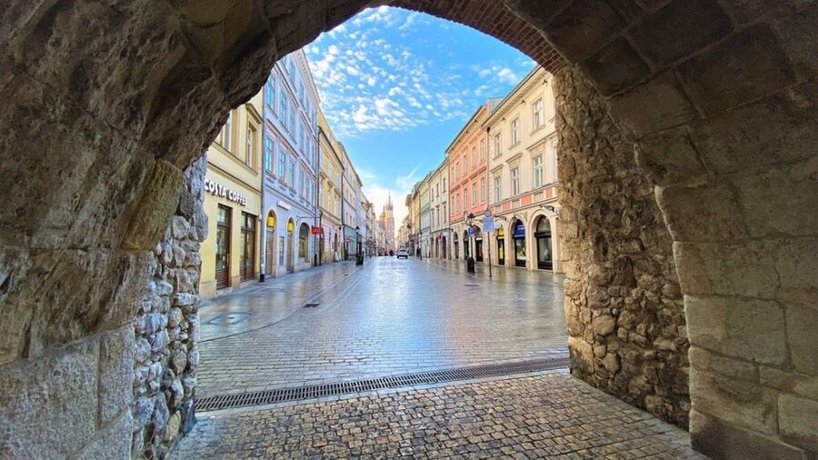 Krakow: Old Town Audioguided walking Tour - Kanonicza Street to Planty Garden Chain, the city breathes
