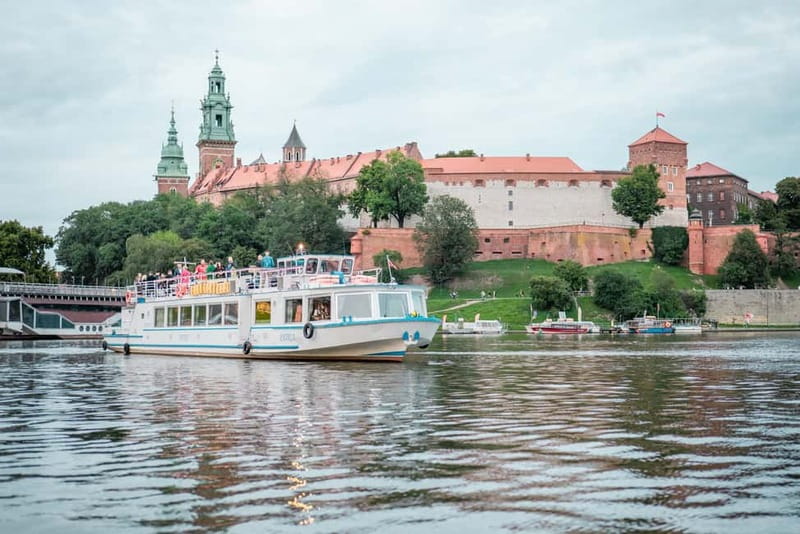 Krakow: Private Evening Boat Tour - Entering Krakow from the water at night