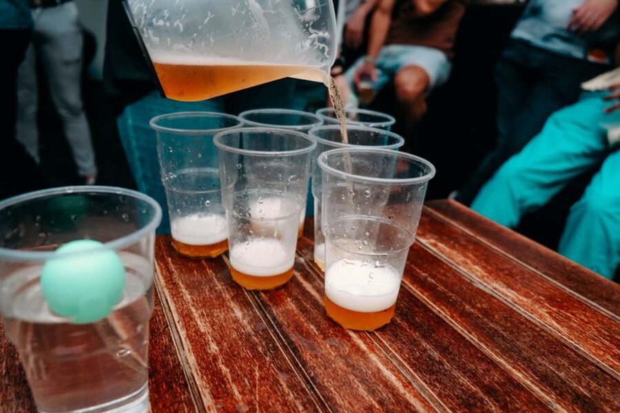 Krakow: Pub, Bar & Club Crawl - The first bar: 1 hour of unlimited drinks plus games to break the ice