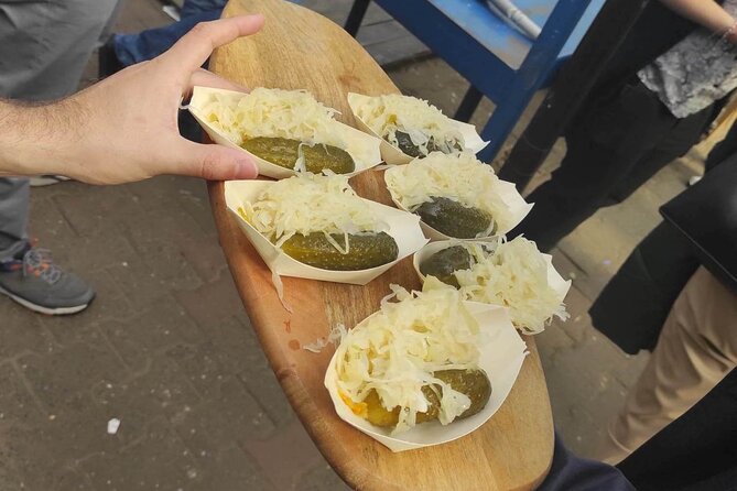 Krakow: Street Food Tasting Walking Tour - Rynek Główny start, where the walking tour actually begins