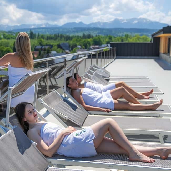 Krakow–Zakopane: Cable Car, Chocholow Baths, Cheese & Vodka - Chocholow Thermal Baths: 3 hours, outdoor pools, slides, and mountain air