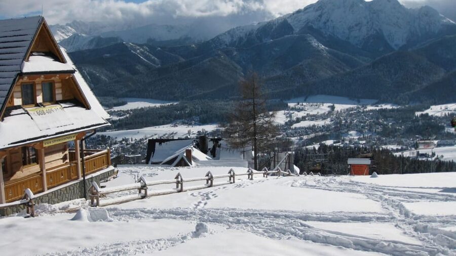 KRAKOW ZAKOPANE TOUR CABLE CAR THERMAL BATHS & HOTEL PICKUP - Chochołów Traditional Wooden Village, an easy culture starter