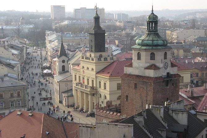 Lublin Old Town Highlights Private Walking Tour - Fara Square and Trinity Tower remains, the oldest layers in plain sight