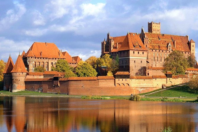 Malbork Castle Private Tour from Gdansk - Entering Malbork Castle with a guide that sets the frame