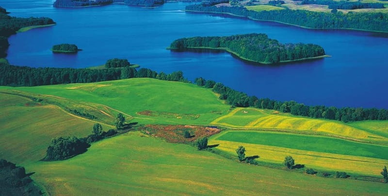 Masurian Lake District: Canoe and Sailing Tour from Warsaw - Canoeing the Krutyń River: calm water, close wildlife, real work
