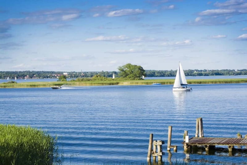 Masurian Lake District: Canoe and Sailing Tour from Warsaw - Mikołajki town center: yachts, lakes, and a quick cultural reset