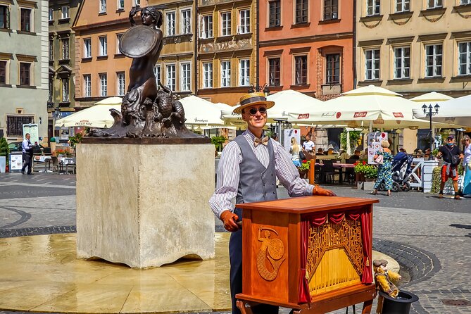 Old Town Warsaw Walking Tour - Practical tips for winter, rain, and hearing the guide
