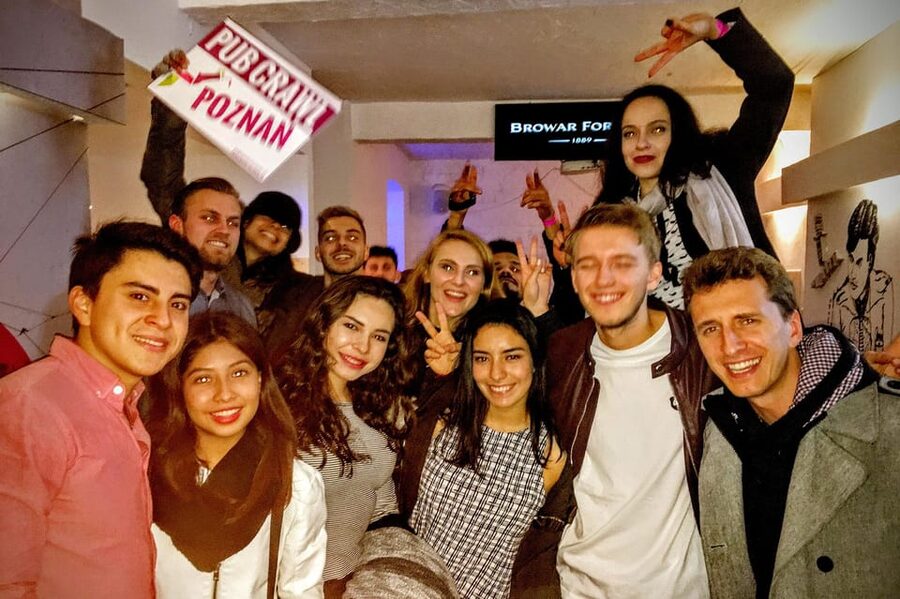 Poznan: Pub Crawl with Free Club Entry - The first bar: discounts, games, and the fastest way to blend in
