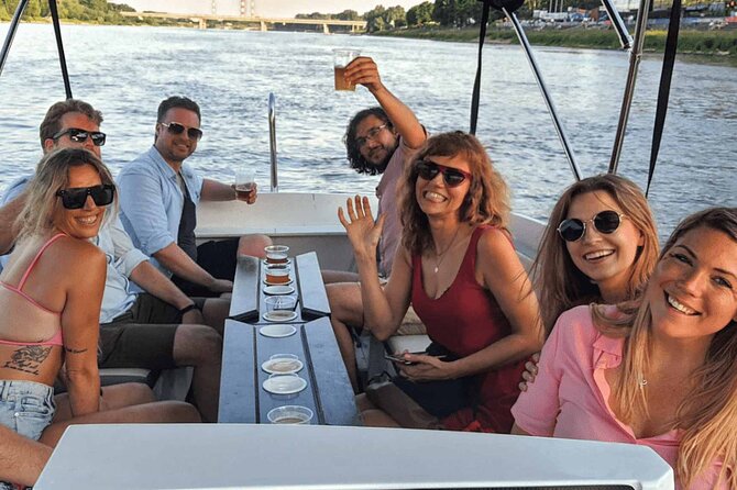 Private Cruise on Vistula in Warsaw for 9 with our Helmsman - Warsaw’s Mermaid and the bridge show: Świętokrzyski, Śląsko-Dąbrowski, and Poniatowski