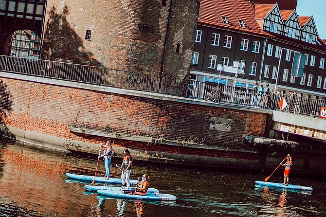 SUP Private Tour in Motlawa River - Wartka Bridge and Ołowianka: how the route links past and newer Gdańsk