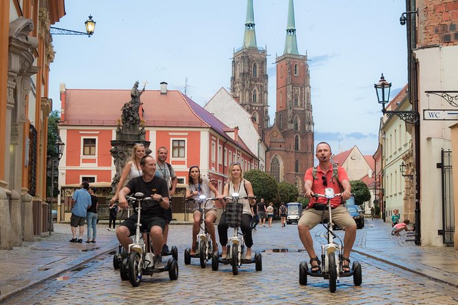 The Classic E-Scooter (3 wheeler) Tour of Wroclaw - everyday tour at 6:00 pm - Meeting point and the ride setup at Kotlarska 18