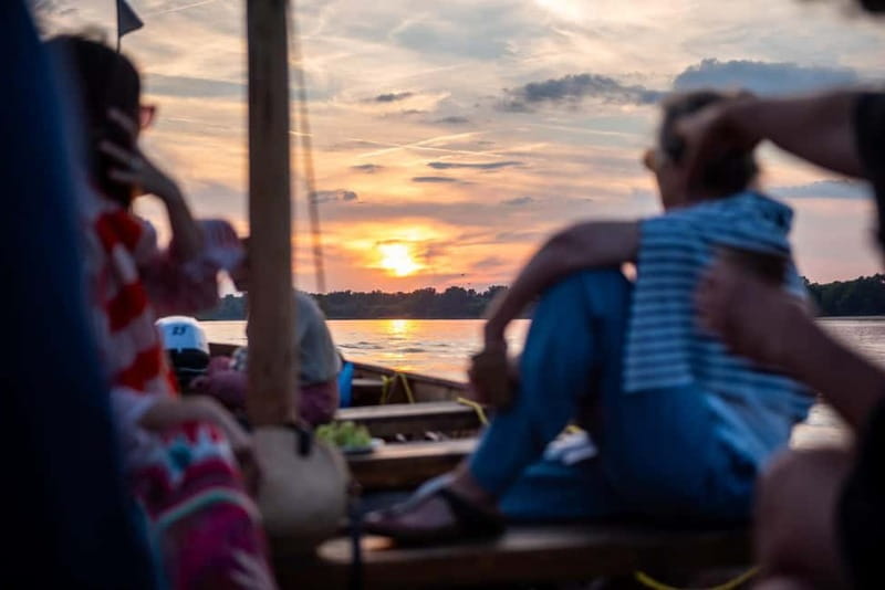 Toruń: Sunset on the Vistula From a Traditional Boat. - The 50-minute flow: from departure to golden-hour skyline views