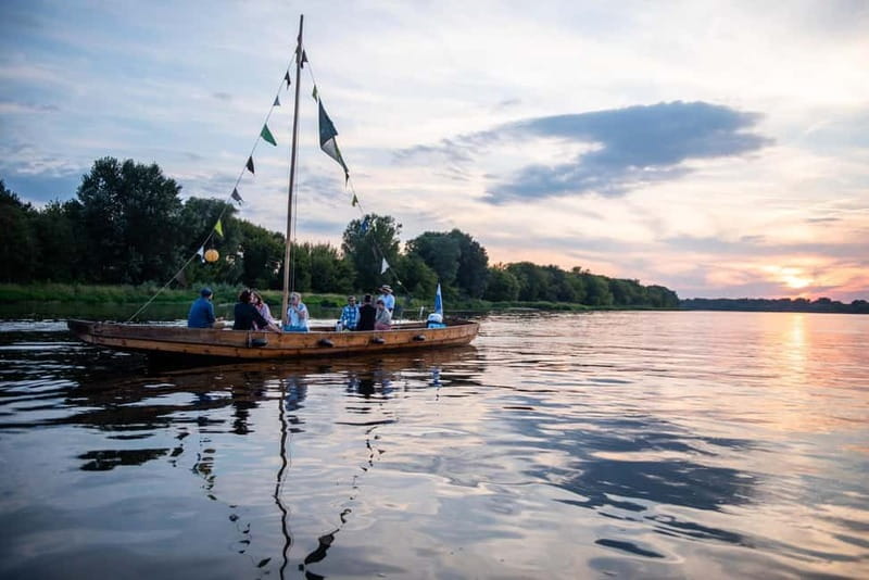 Toruń: Sunset on the Vistula From a Traditional Boat. - Comfort details that actually matter: chairs, umbrellas, blankets, and life vests