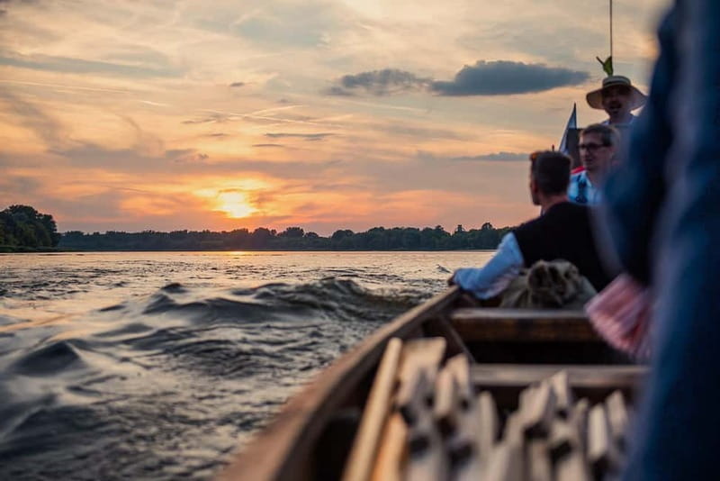 Toruń: Sunset on the Vistula From a Traditional Boat. - The boat style: open deck, traditional wooden ride, small group calm
