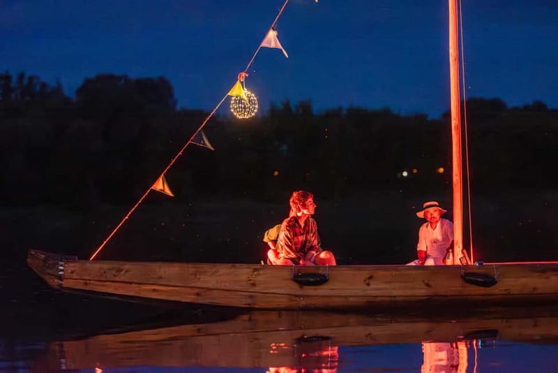 Toruń: Toruń at Night from a Boat on the Vistula - The Traditional Vistula Wooden Boat, and why the design matters at night