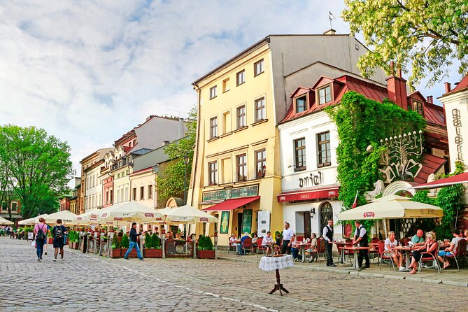 Tour via Kazimierz Quarter by Golf Cart with Schindler's Museum in Krakow - Plac Nowy, market life, and the ghetto-era geography shift