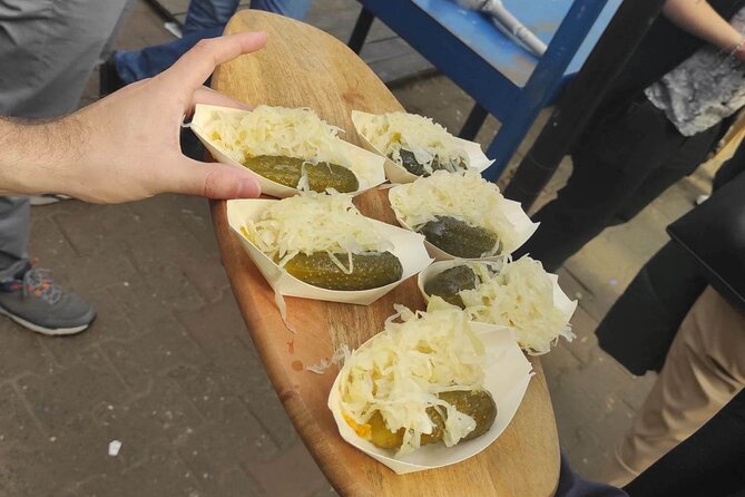 Walking Guided Tour with Street Food in Krakow - Rynek Główny to Old Town: pierogi, obwarzanek, zapiekanka, vodka